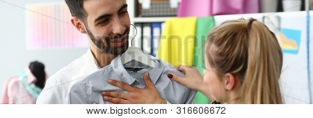 Assistant Buyer Fashion Tailor Profession Concept. Blond Woman Standing Near Male Client Fitting On 