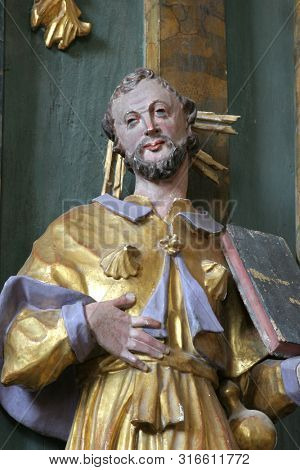 CAZMA, CROATIA - SEPTEMBER 26, 2011: Statue of Saint on the altar of the Saint Roch in the Church of Saint Mary Magdalene in Cazma, Croatia