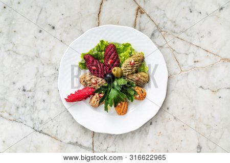 Phali - a traditional Georgian snack with vegetables and nuts top view