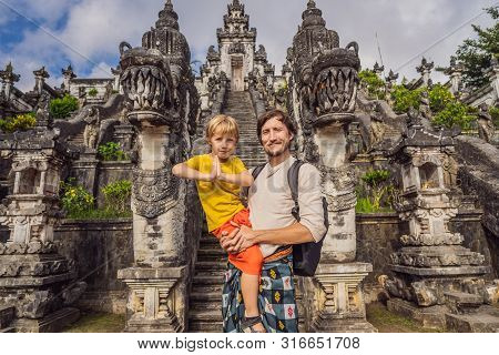 Dad And Son Tourists On Background Of Three Stone Ladders In Beautiful Pura Lempuyang Luhur Temple. 