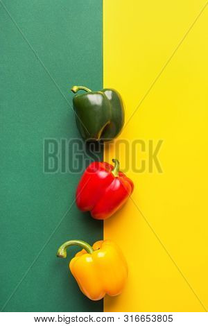 Ripe Organic Vegetables Colorful Red Yellow Green Bell Peppers On Duotone Background. Healthy Plant 
