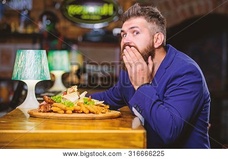 Man Received Meal With Fried Potato Fish Sticks Meat. Delicious Meal. Enjoy Meal. High Calorie Snack