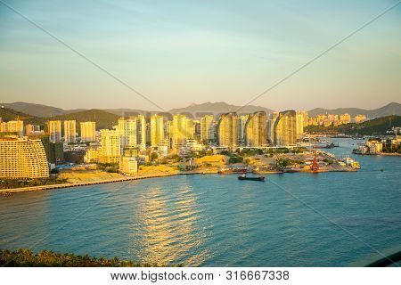 Sanya Town Evening Cityscape, View From Phoenix Island On Hainan Island In China