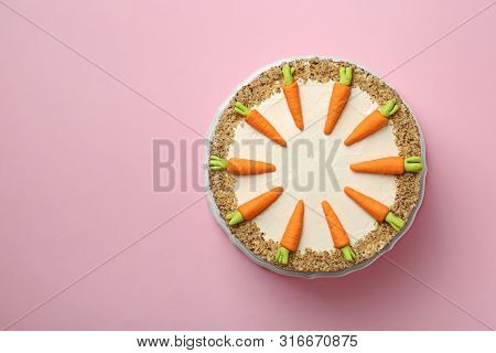 Dish With Tasty Carrot Cake On Pink Background, Top View. Space For Text