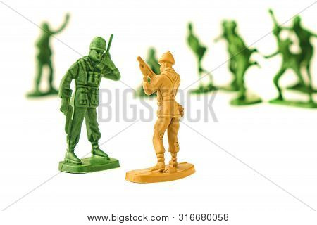 Miniature Toy Soldiers On White Background, Close-up