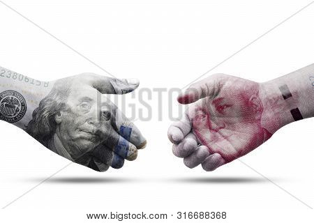 Us Dollar And China Yuan Banknote Print Screen On Handshake With White Background.it Is Symbol Of Ec