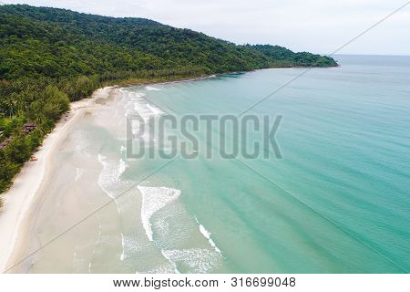 Tropical Sea Wave White Sand Beach With Green Tree Aerial View In Koh Kood