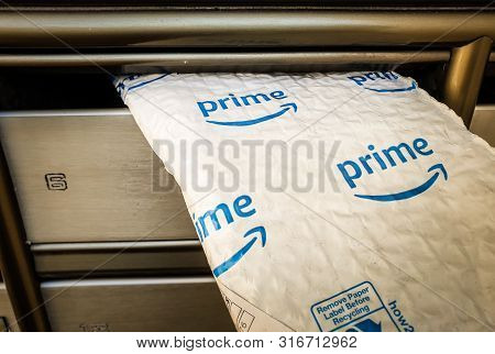Tel-aviv, August 2019: Amazon Prime Envelope Stuck In Mailbox