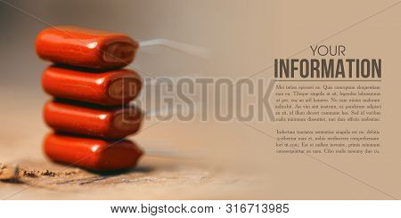 Ceramic Capacitor Radio Components On Wooden Background