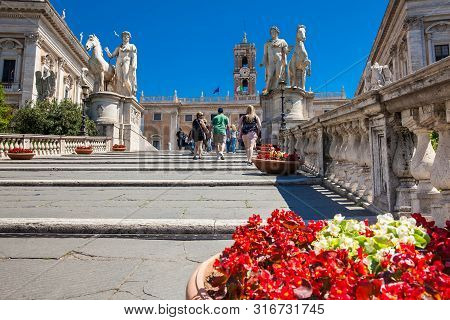 Rome, Italy - April, 2018: Tourists Visiting The Capitoline Hill And The Palazzo Senatorio