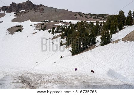 Lassen National Park, Ca - July 9, 2019: Hikers Begin Their Ascent To Lassen Peak Trail, Despite The