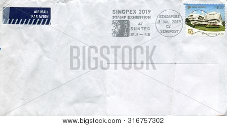 GOMEL, BELARUS - AUGUST 08, 2019: Old envelope which was dispatched from Singapore to Gomel, Belarus, August 08, 2019. 