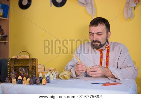 Professional Male Potter In Russian Ethnic Shirt Making Clay Figure For Medieval Popular Strategy Bo