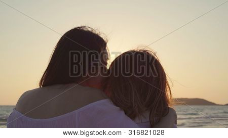Young Asian Lesbian Couple Kissing Near Beach. Beautiful Women Lgbt Couple Happy Relax Enjoy Love An