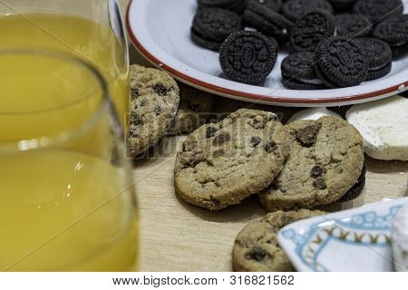 Rich, But A Lot Of Sugar On This Table Of Sweets And Natural Orange Juice