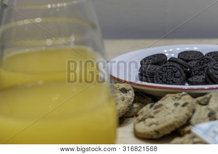 Rich, But A Lot Of Sugar On This Table Of Sweets And Natural Orange Juice