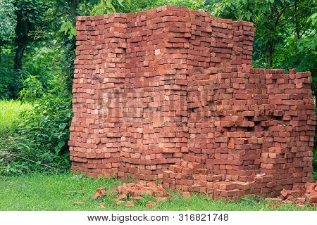 Inidan Red Clay Bricks Piles In Stacks.
