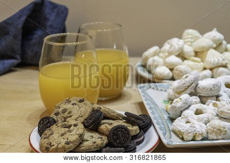 Rich, But A Lot Of Sugar On This Table Of Sweets And Natural Orange Juice