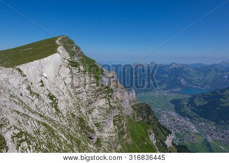 Peak Of Rautispitz, Blue Sky, Village Of Naefels And Lake Walen