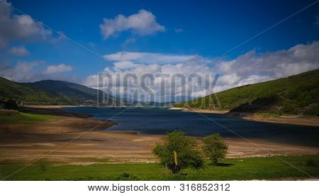 Landscape Of Mavrovo National Park With Mountain And Lake In Fyr Macedonia