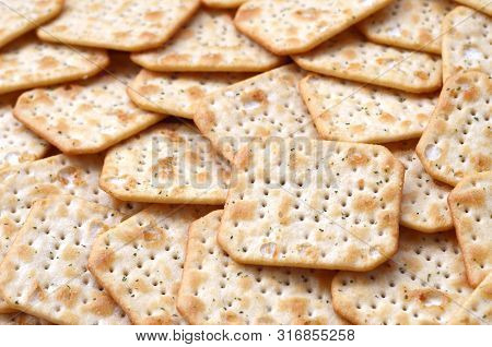Tuc Original Snack Crackers Lies On Market Table Stacked In Big Pile