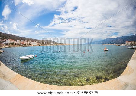 Shore Of The Adriatic Sea. Sea Coast Of Croatia. Calm Water. Beautiful Places Of European Cities. Sk