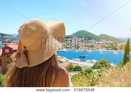 Back View Traveler Woman With Hat Looking At Dubrovnik Landscape, Croatia, Europe