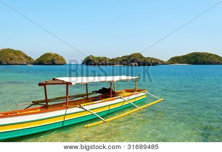 colorful boat on a tropical beach