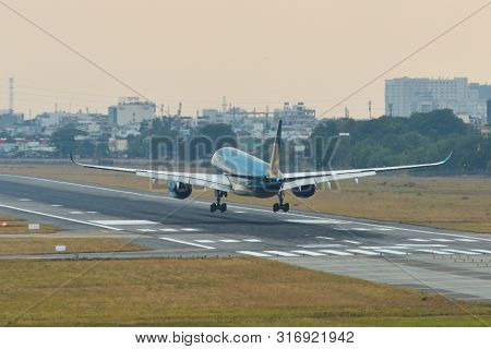 Passenger Airplane Landing At Saigon Airport
