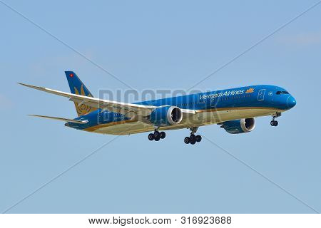 Passenger Airplane Landing At Saigon Airport