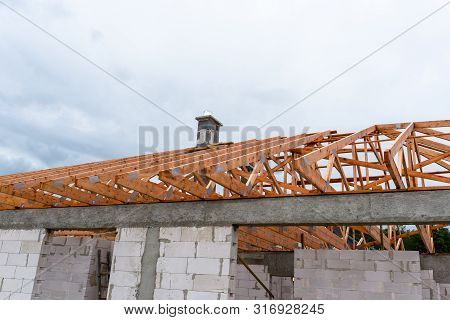 Roof Trusses Not Covered With Ceramic Tile On A Detached House Under Construction, Visible Roof Elem