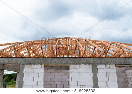 Roof Trusses Not Covered With Ceramic Tile On A Detached House Under Construction, Visible Roof Elem
