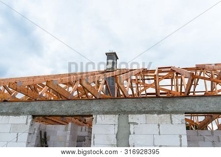 Roof Trusses Not Covered With Ceramic Tile On A Detached House Under Construction, Visible Roof Elem