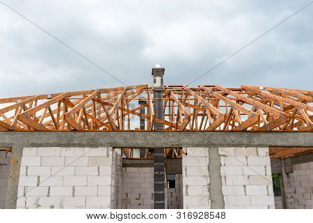 Roof Trusses Not Covered With Ceramic Tile On A Detached House Under Construction, Visible Roof Elem