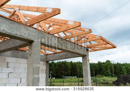 Roof Trusses Not Covered With Ceramic Tile On A Detached House Under Construction, Visible Roof Elem
