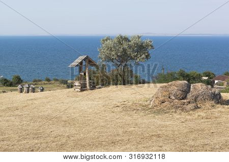 Taman, Temryuk District, Krasnodar Region, Russia - July 17, 2019: Landscape With A Well In The Ethn