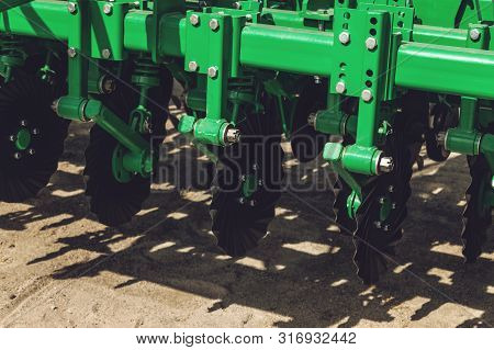 Working Parts Of New Agricultural Disc Harrow. Plow. Harrow. Cultivator For Cultivating The Earth.