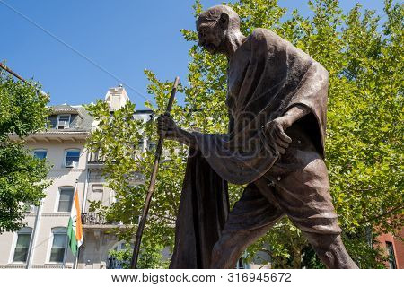 Washington, Dc - August 8, 2019: Large Mahatma Mohandas Gandhi Statue Located Outside Of The India E