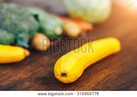 Fresh Salubrious Colourful Vegetables On Wooden Background, Squash In Focus, Potatoes, Carrots, Broc