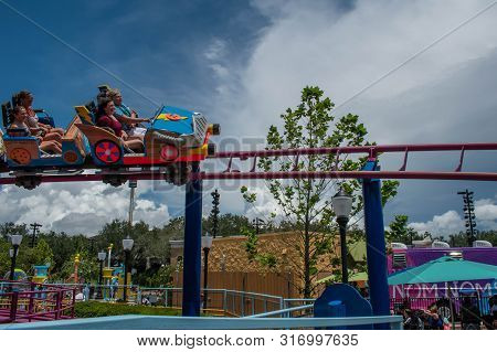 Orlando, Florida. August 07, 2019. People Enjoying Super Grovers Box Car Derby. It Is A Family Frien