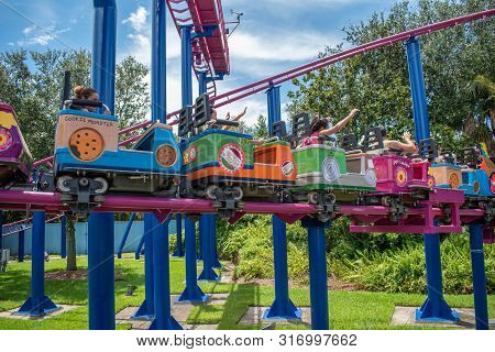 Orlando, Florida. August 07, 2019. People Enjoying Super Grovers Box Car Derby. It Is A Family Frien