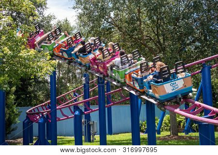 Orlando, Florida. August 07, 2019. People Enjoying Super Grovers Box Car Derby. It Is A Family Frien