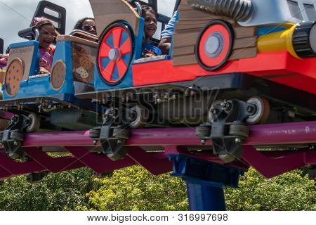 Orlando, Florida. August 07, 2019. People Enjoying Super Grovers Box Car Derby. It Is A Family Frien