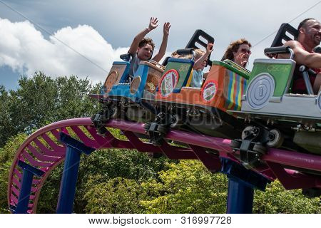 Orlando, Florida. August 07, 2019. People Enjoying Super Grovers Box Car Derby. It Is A Family Frien