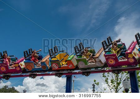 Orlando, Florida. August 07, 2019. People Enjoying Super Grovers Box Car Derby. It Is A Family Frien