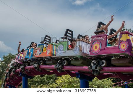 Orlando, Florida. August 07, 2019. People Enjoying Super Grovers Box Car Derby. It Is A Family Frien