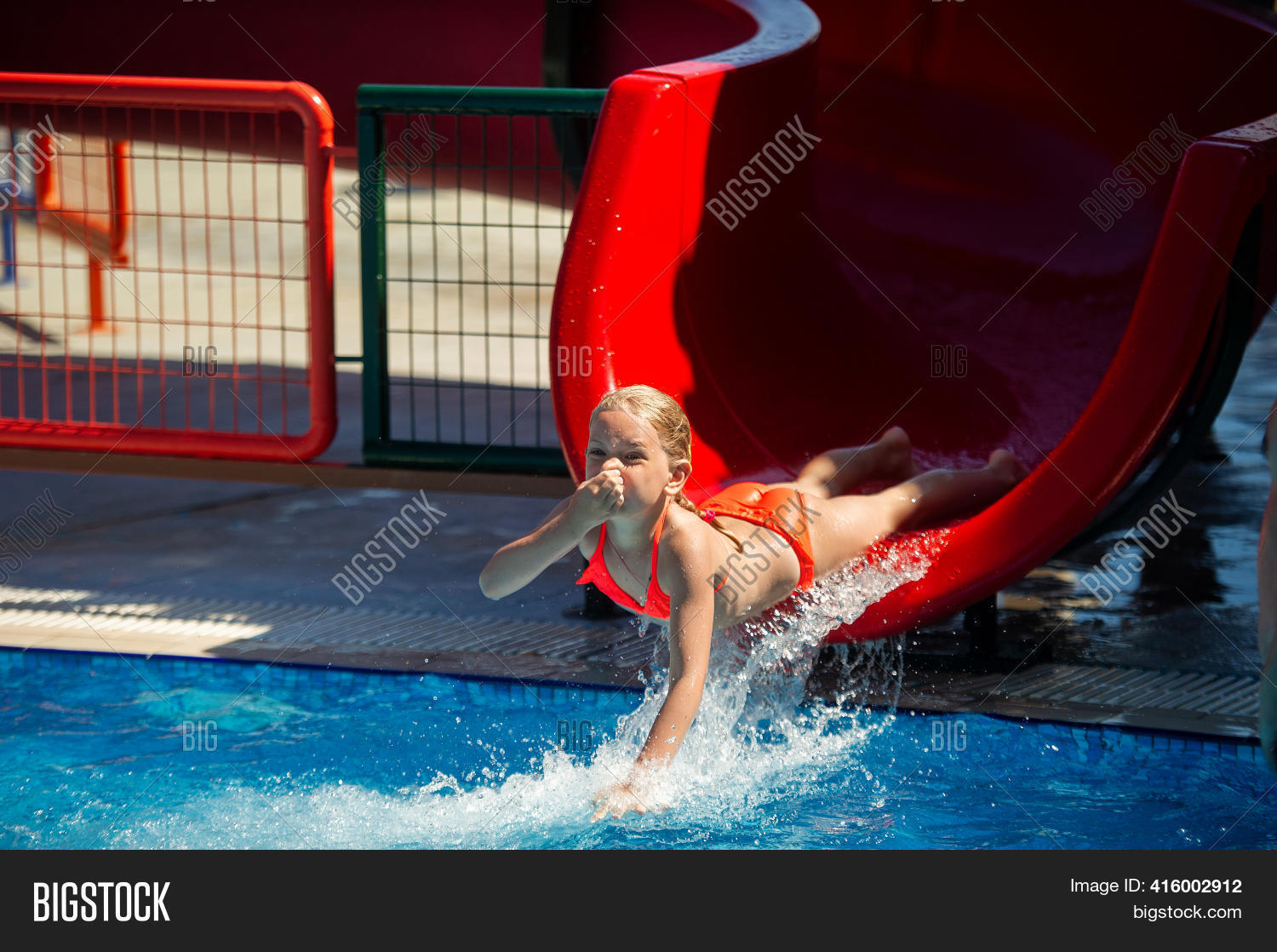 Little Girl Slides Image & Photo (Free Trial) Bigstock