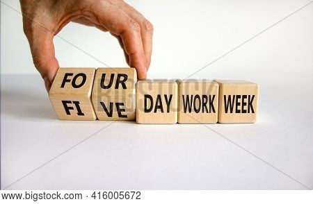4 Or 5 Day Work Week Symbol. Businessman Turns Cubes, Changes Words 'five Day Work Week' To 'four Da