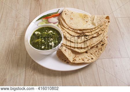 Indian Cuisine Kadhi - Vegetarian Curry Made Of Buttermilk And Chick Pea Flour. Served In A Bowl Or 