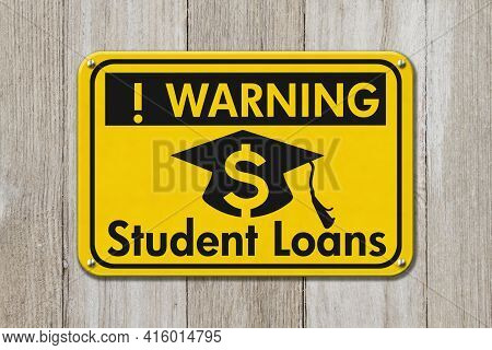 Student Loan Warning Message With Grad Hat And Dollar Sign Symbol On A On Yellow Caution Sign On Wea